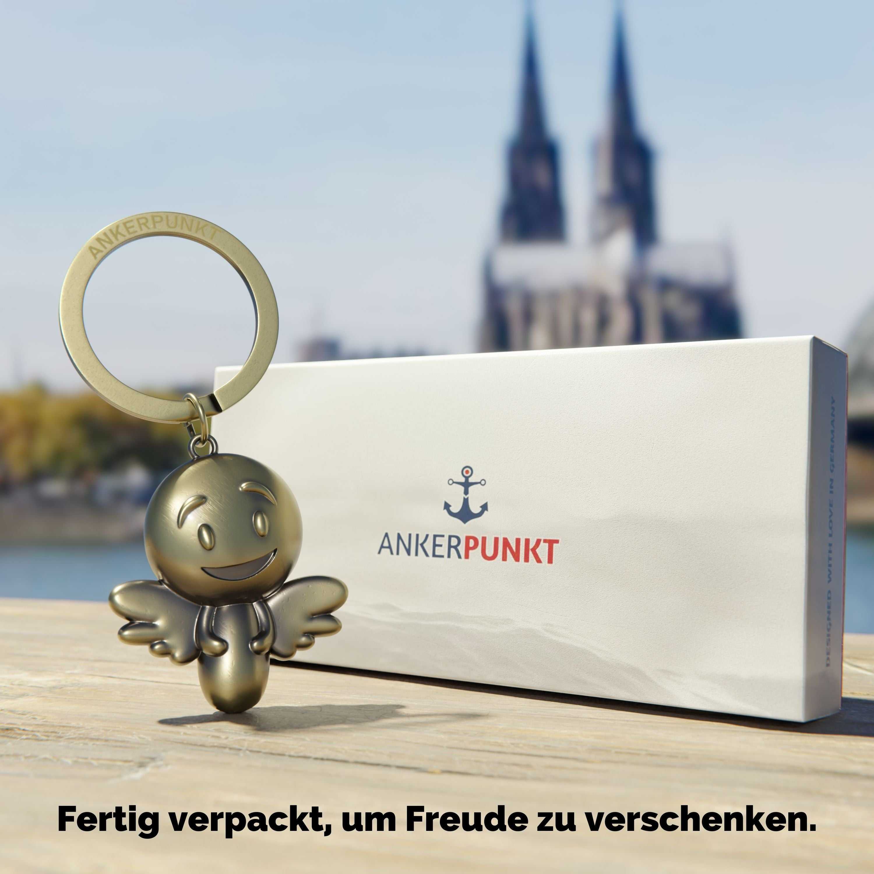 Schutzengel Schlüsselanhänger Engel Smiley in gold vintage vor Geschenkbox.