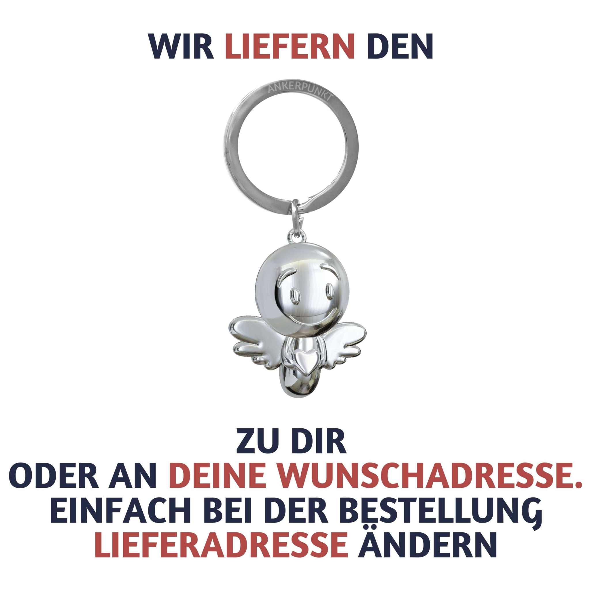 Silber glänzender Schutzengel Schlüsselanhänger mit freundlichem Gesicht, ideal als Geschenk oder Glücksbringer für jede Gelegenheit.